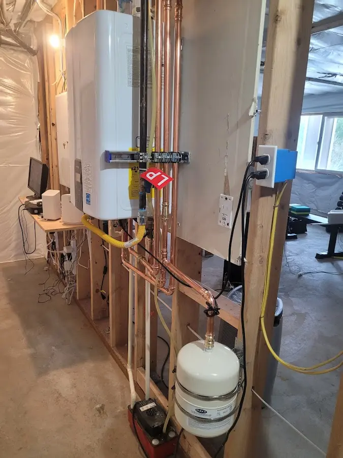 Licensed plumber repairing a kitchen sink in Brutus